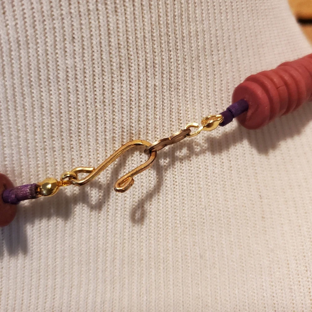 African inspired long wooden bead necklace in maroon, purple & green